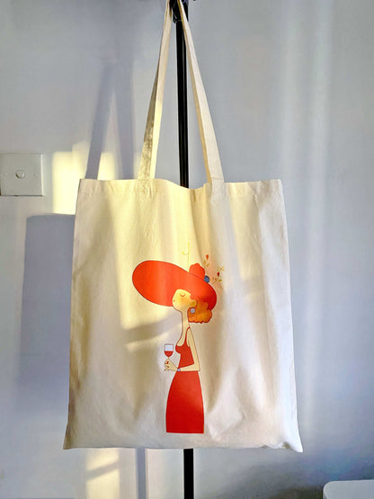 Minimalist cotton tote bag with a unique woman print, suitable as a sustainable gift for birthdays, holidays, or casual daily errands.