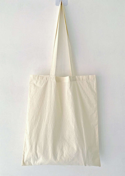 soft-textured cotton shoulder bag for effortless Parisian lifestyle