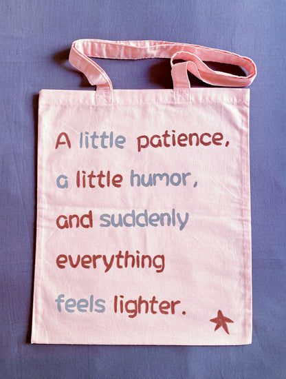 Soft pink cotton tote made from natural materials, featuring a small handwritten English detail