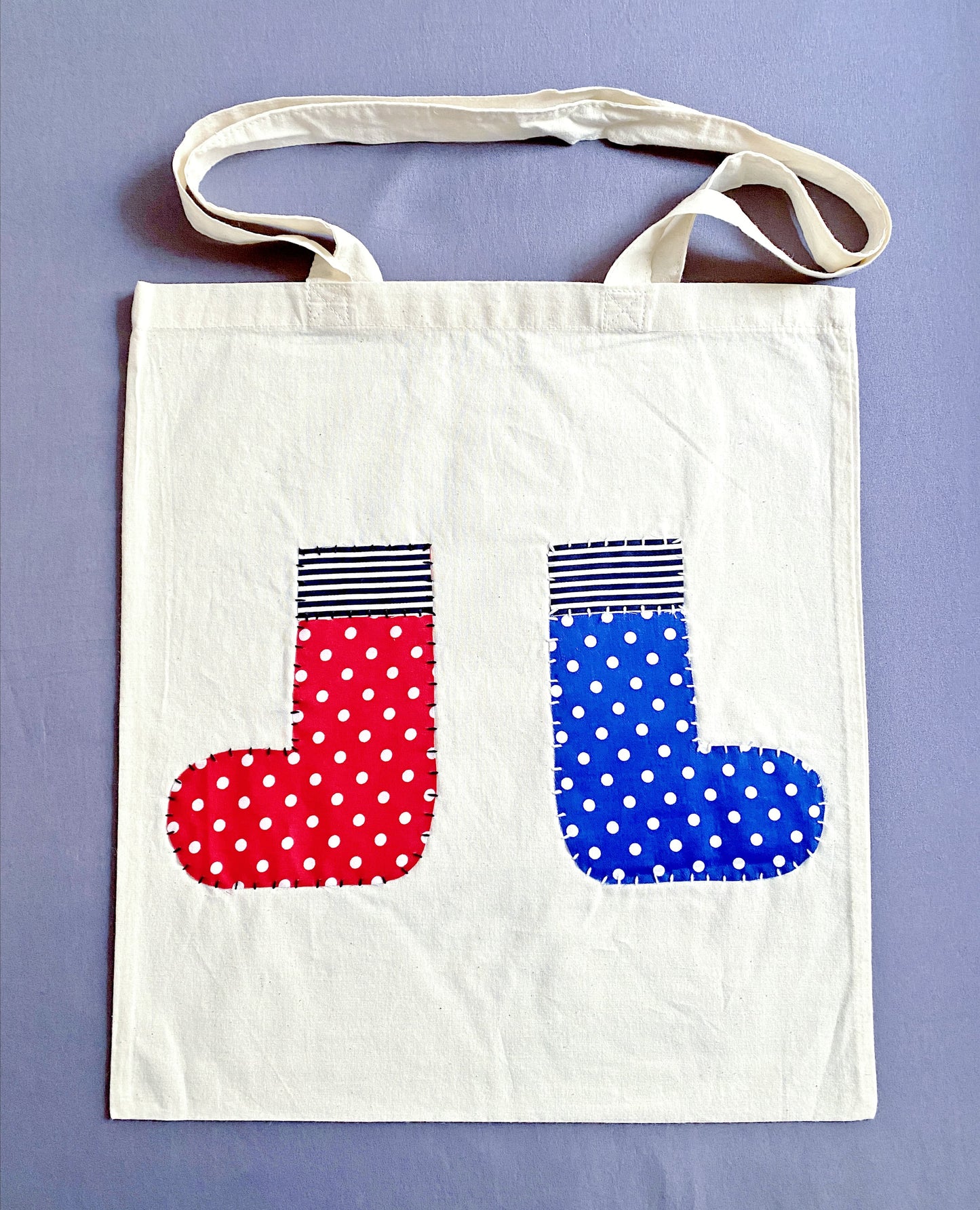 A natural cotton shoulder bag perfect for light travel and spontaneous plans