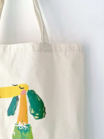Natural cotton tote bag that complements casual weekend outfits.