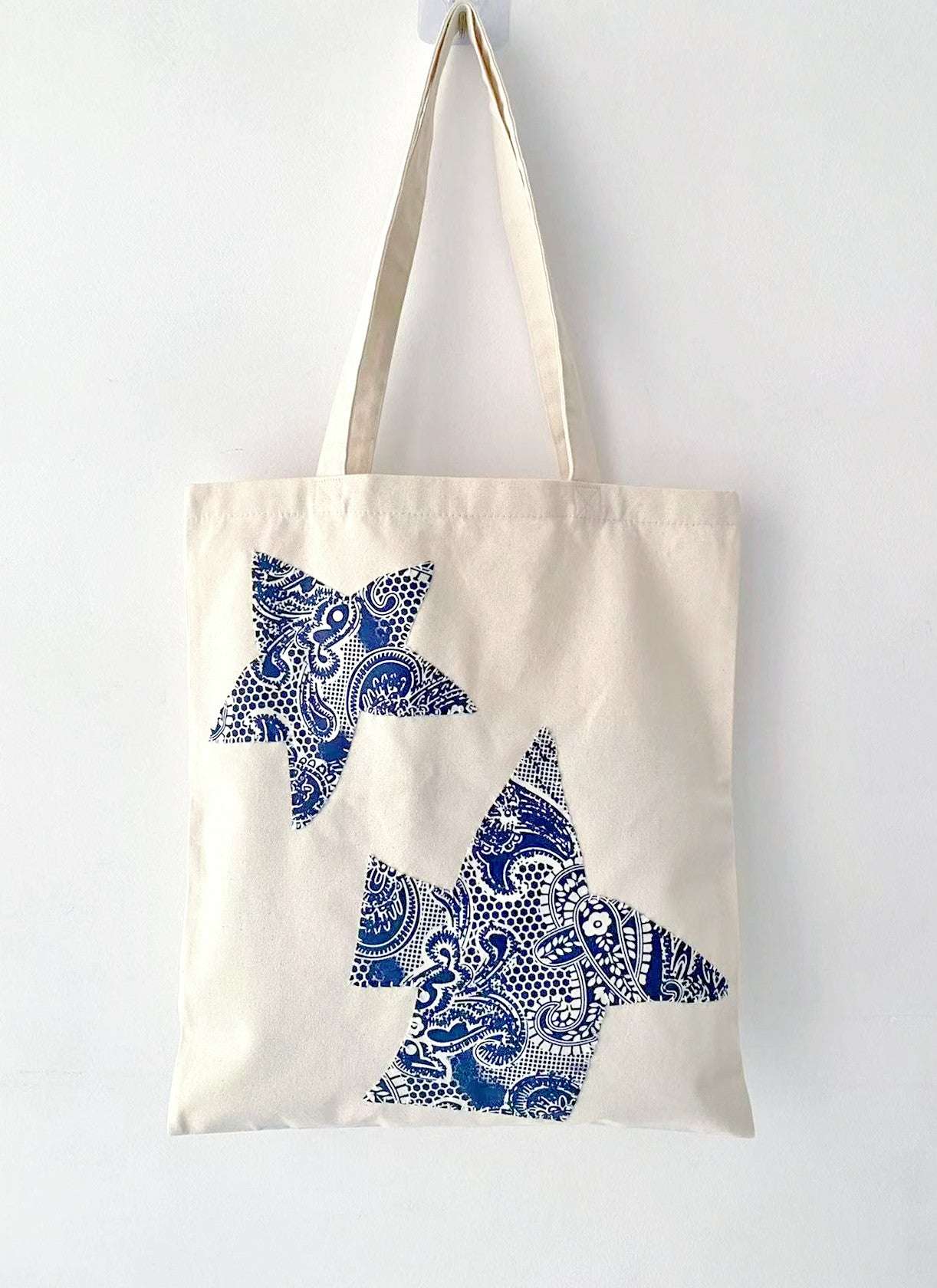 Cotton canvas bag with bohemian-inspired hand-stitched elements