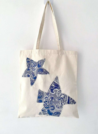 Cotton canvas bag with bohemian-inspired hand-stitched elements