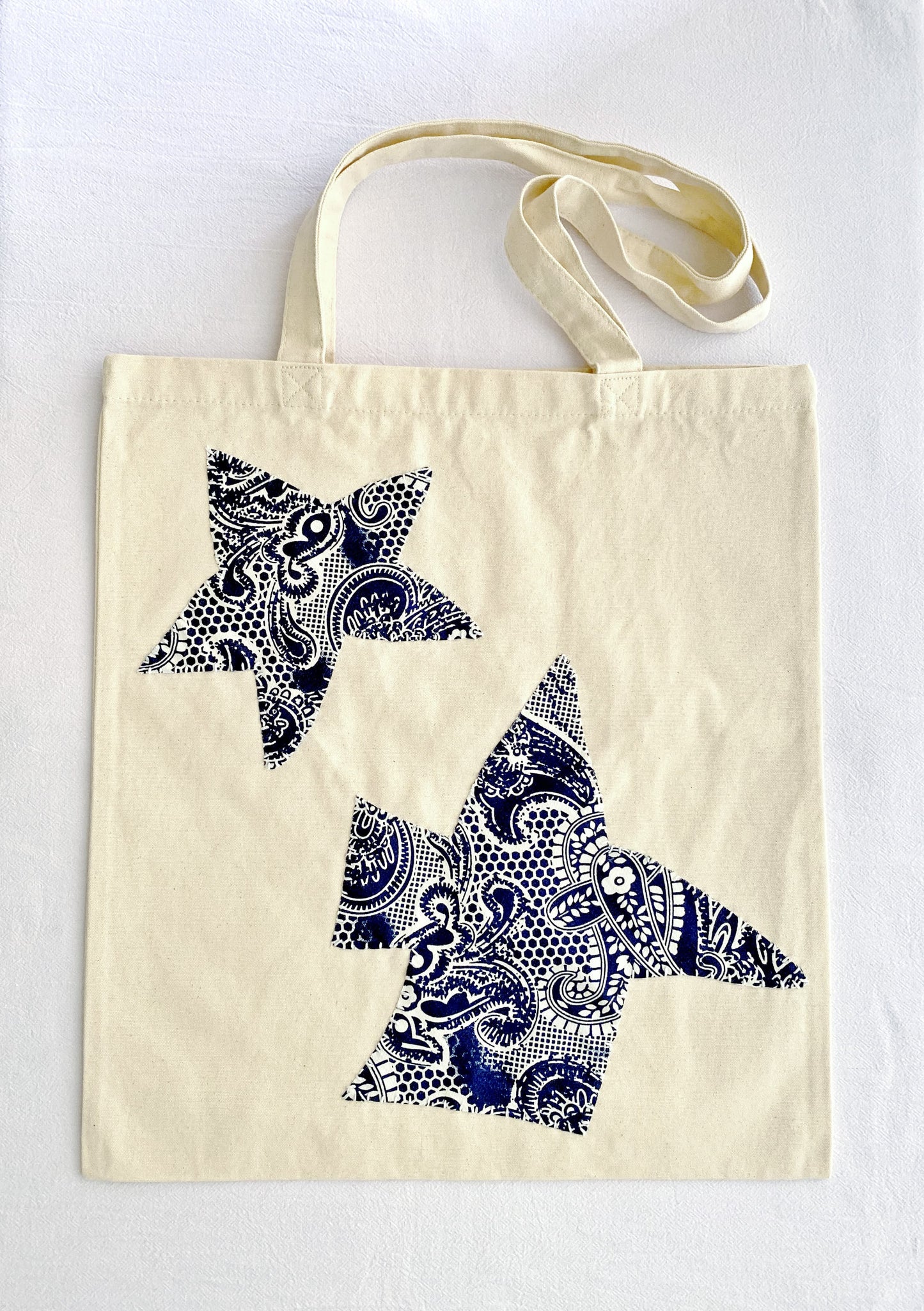 handcrafted patchwork details on eco canvas bag