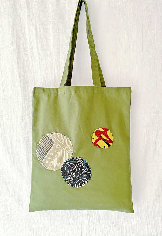 Minimalist cotton bag with eco-friendly materials and artistic touch