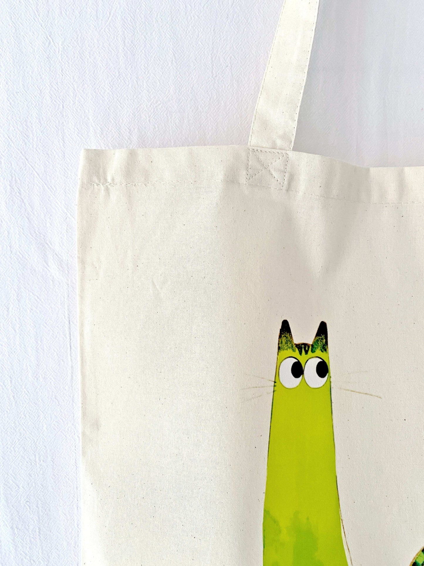 Hand-printed eco tote inspired by nature and artistic simplicity.