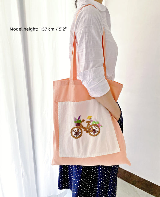 Durable large-capacity orange tote bag made of natural cotton with artisan embroidery