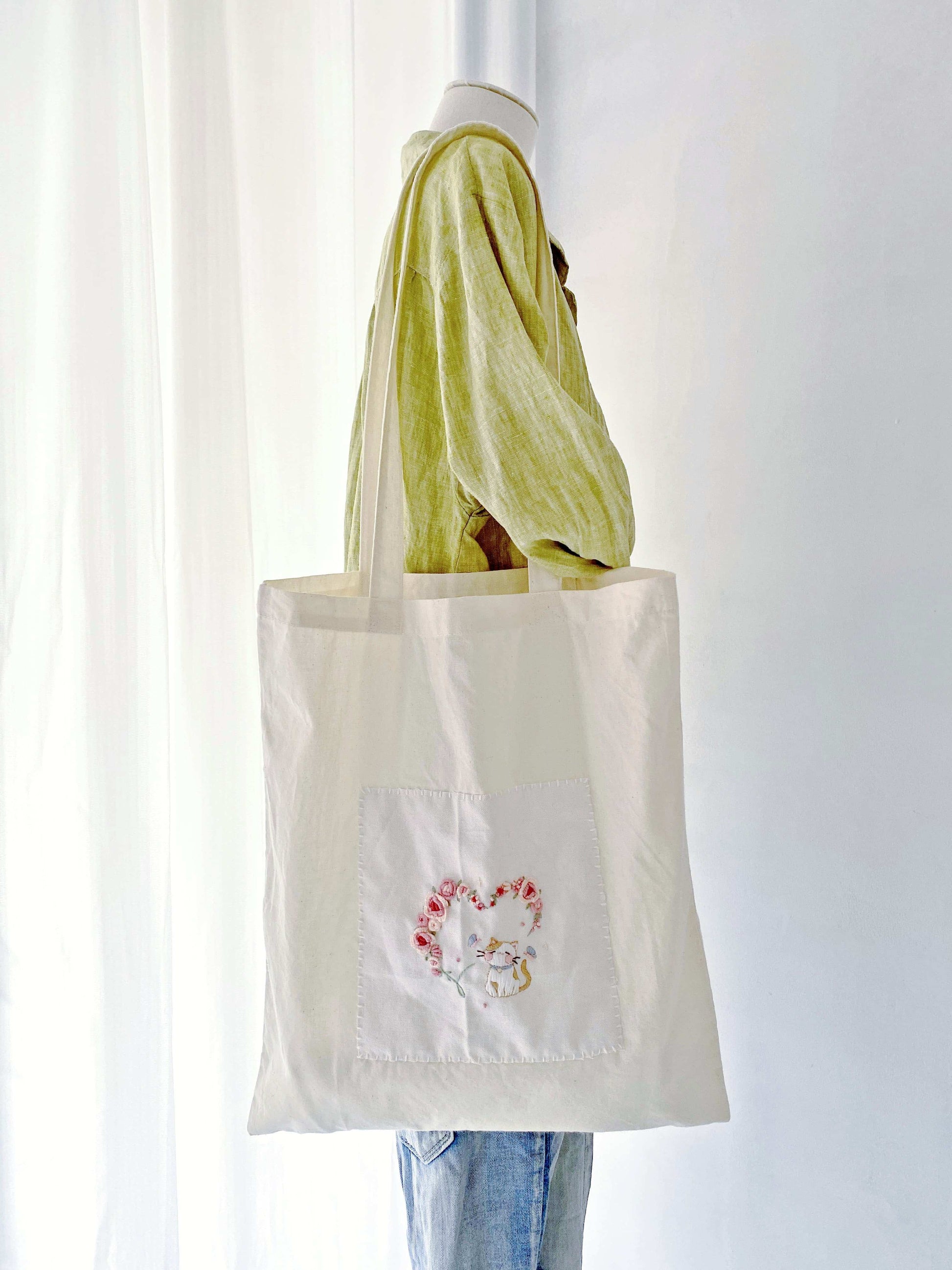 oversized eco tote with hand embroidered artistic patterns