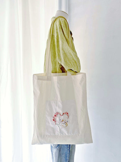 oversized eco tote with hand embroidered artistic patterns