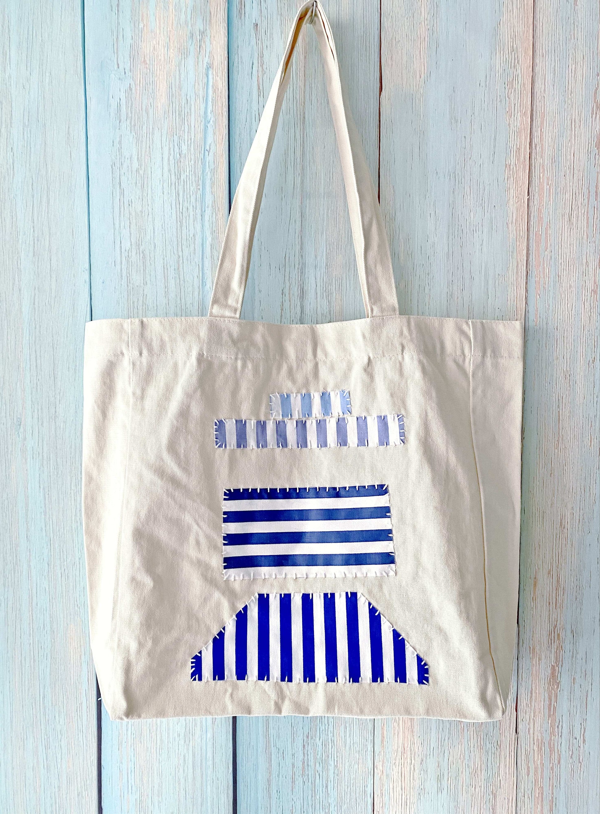 Lightweight cotton tote that combines modern simplicity with eco values