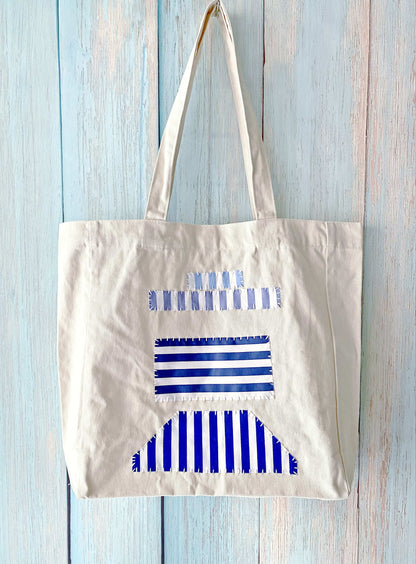 Lightweight cotton tote that combines modern simplicity with eco values