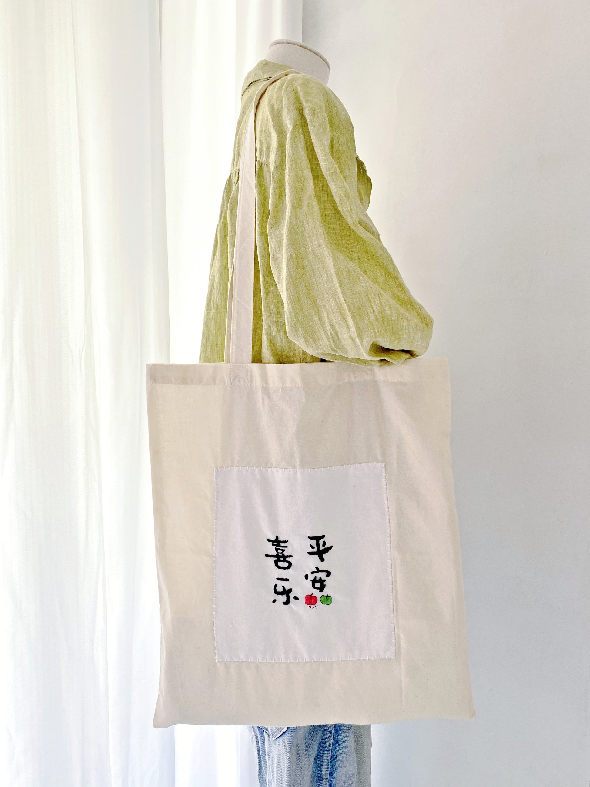 ultra thin cotton tote bag with unique embroidered typography