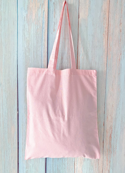 Relaxed-style cotton bag with airy construction and a tiny handwritten English touch