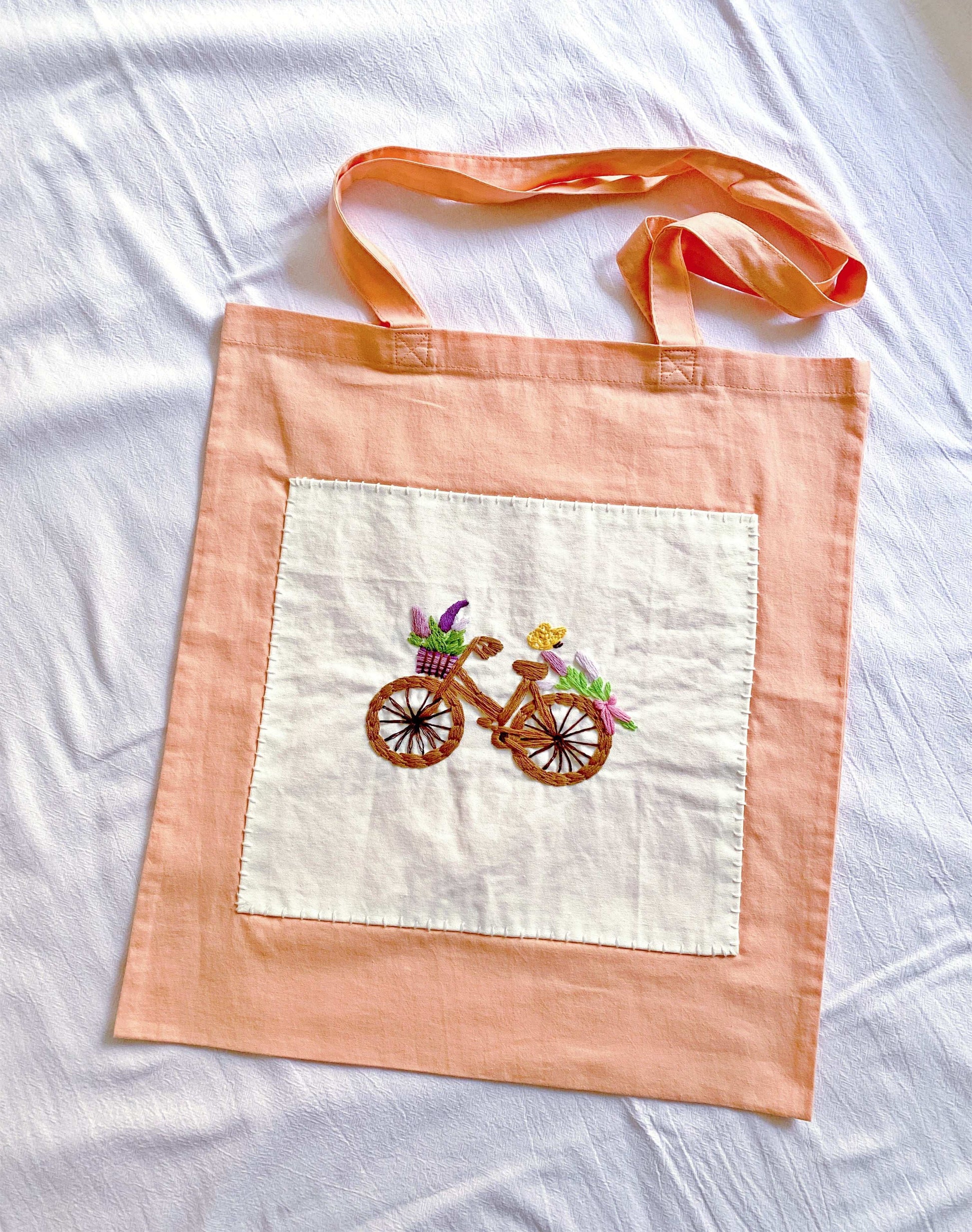 Minimalist soft tote with artisanal texture and a relaxed look