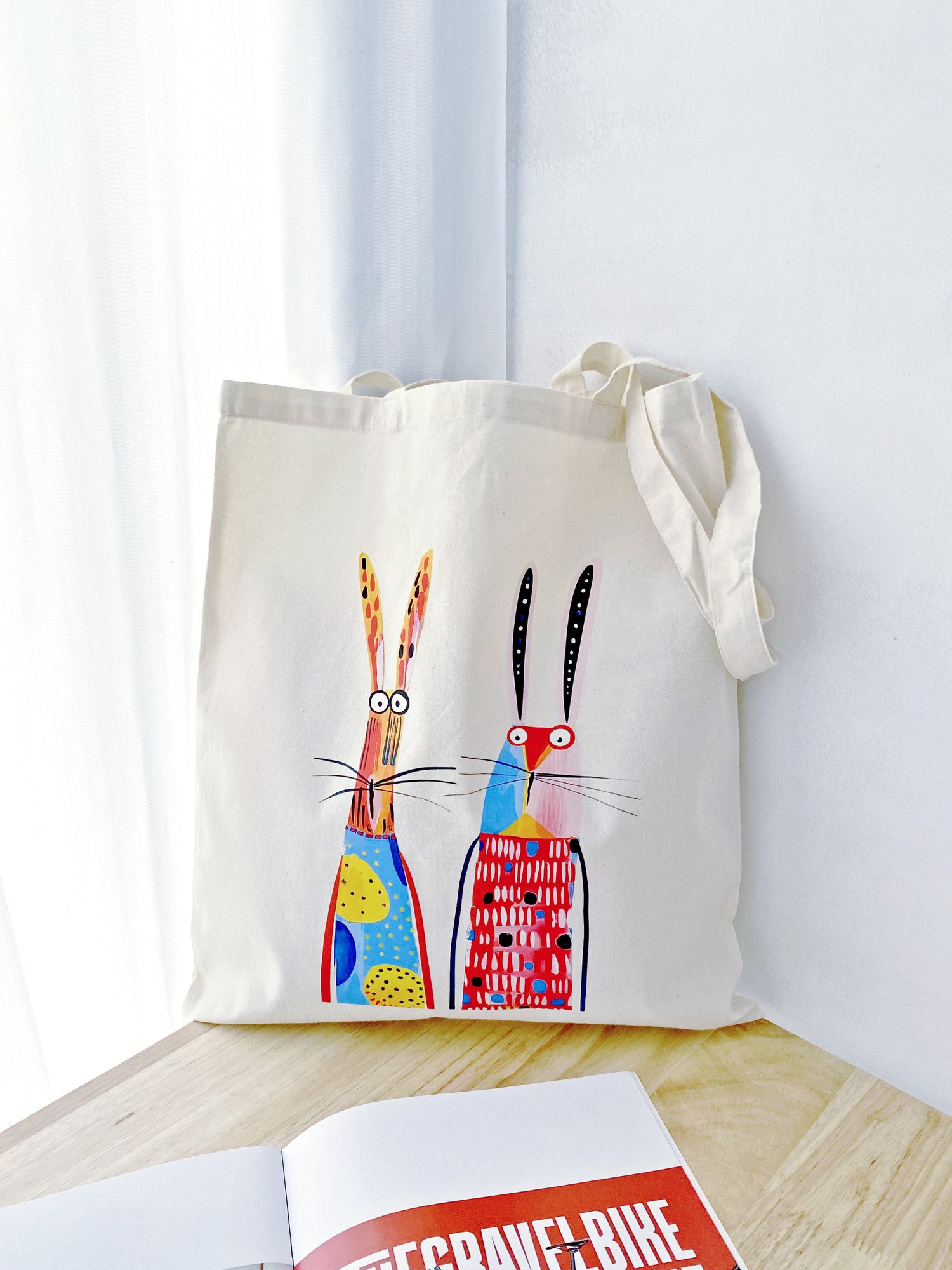 Relaxed minimalist cotton tote for eco-conscious women who love simple yet meaningful art.