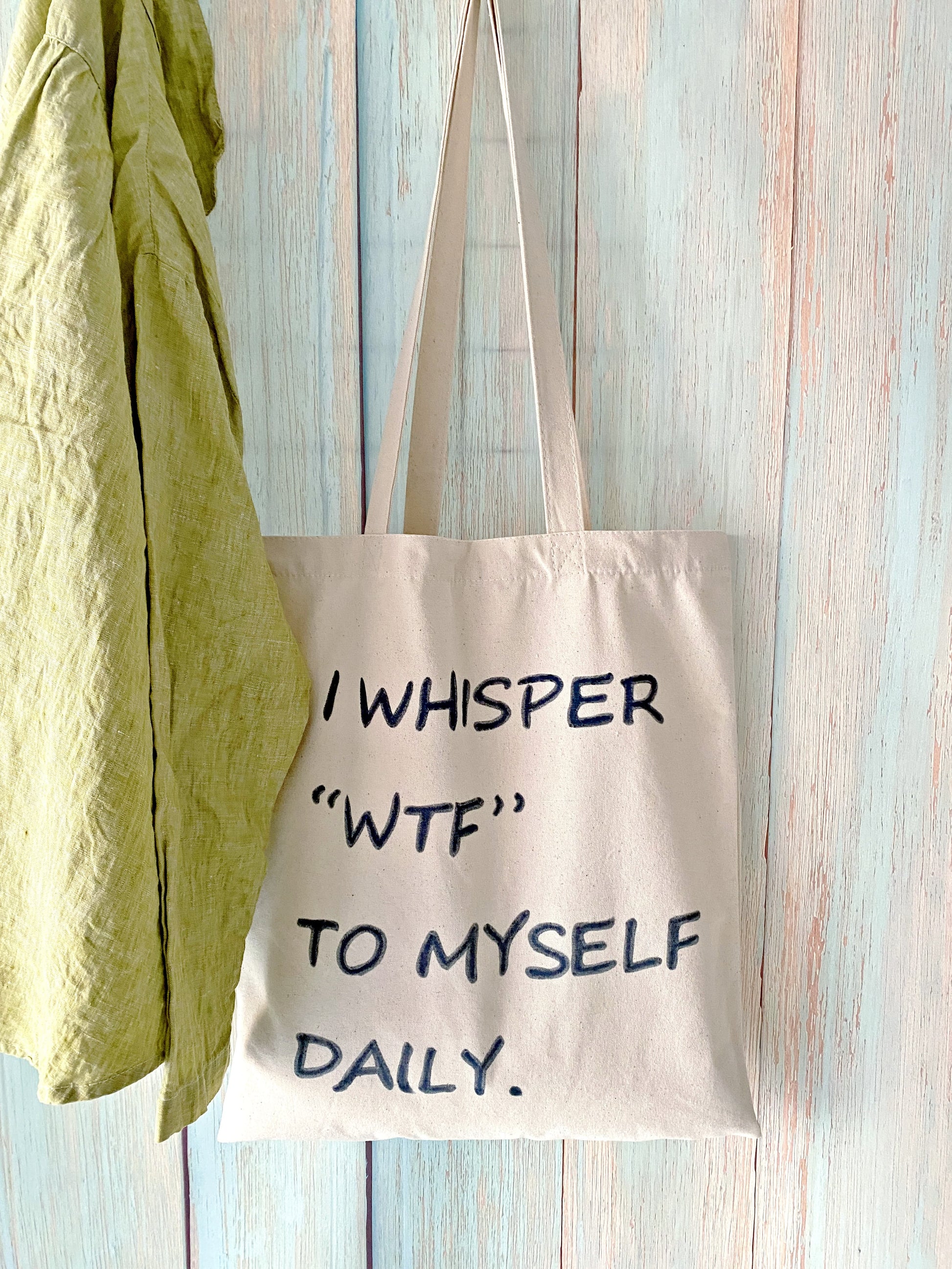 minimalist canvas bag with casual handwritten accent