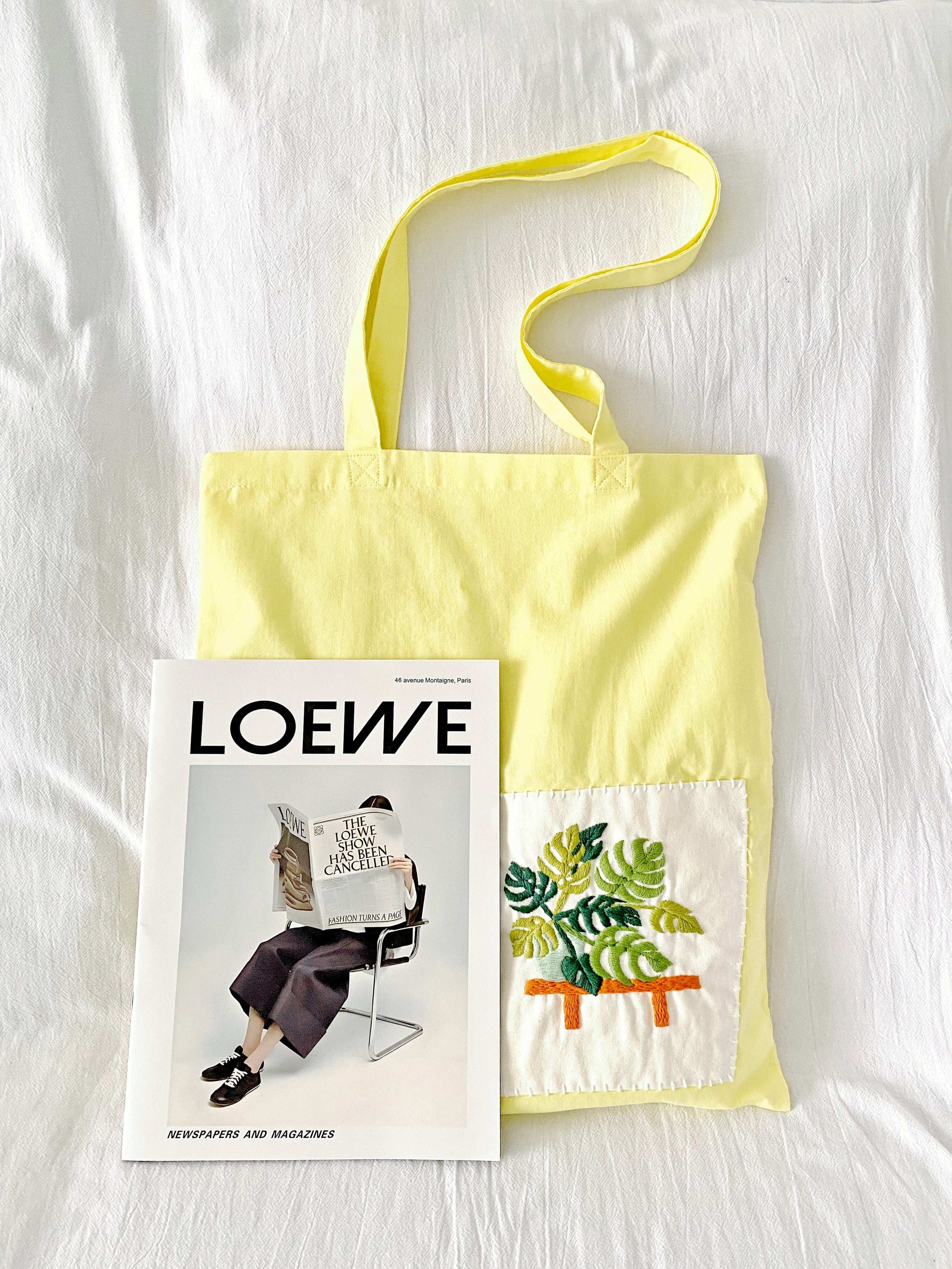 natural cotton tote with elegant stitched flowers