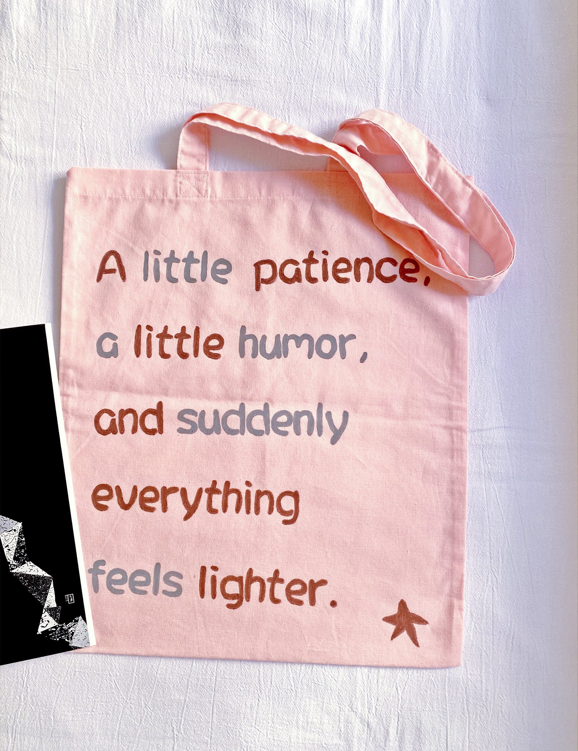 Pink cotton shopping tote with a subtle hand-written element that adds personality