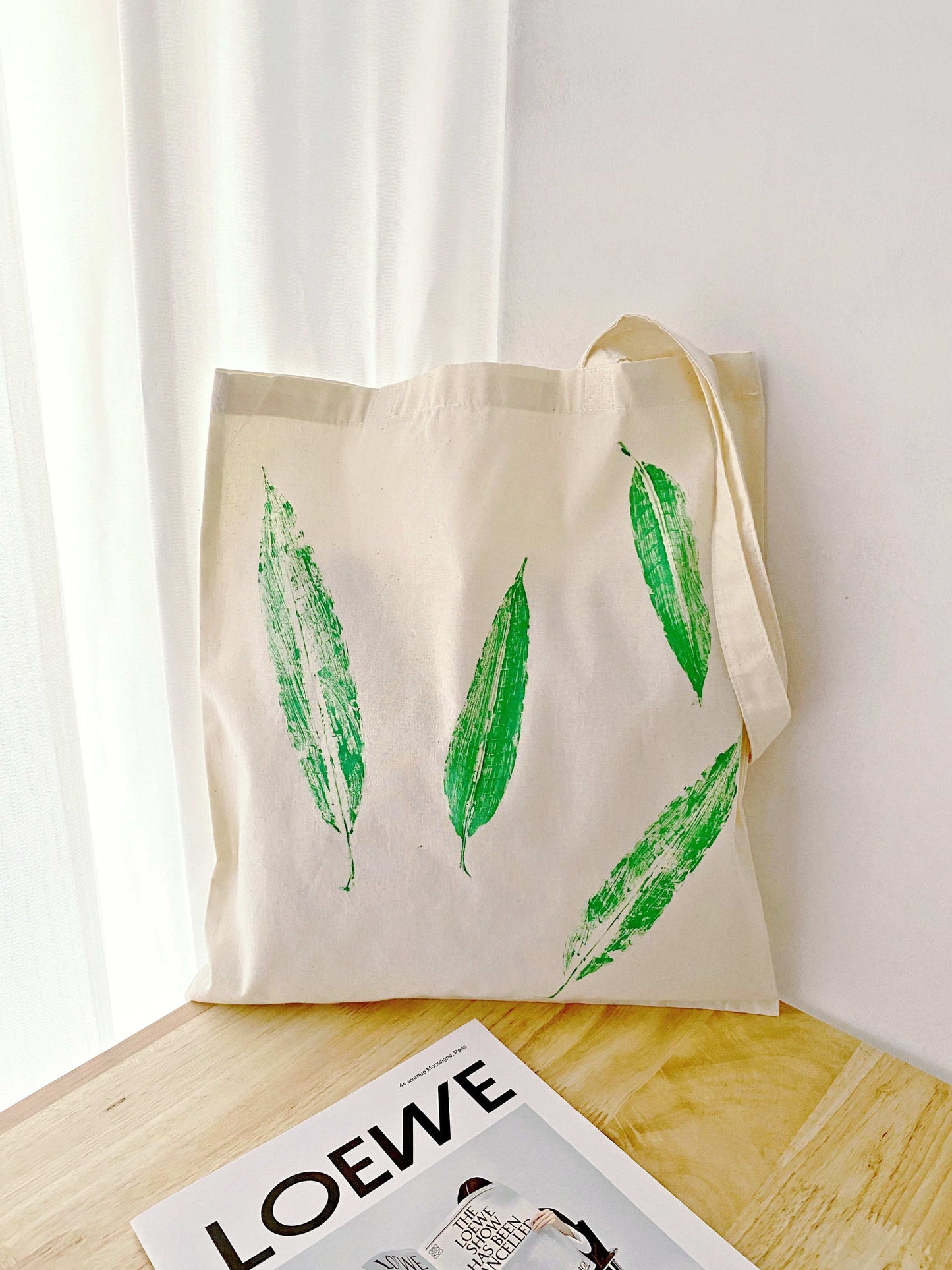 Handcrafted-inspired tote bag with botanical leaf art