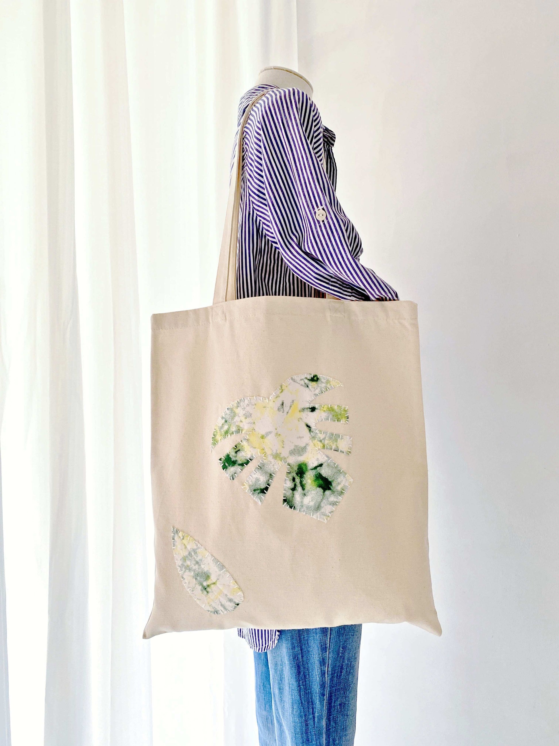 Sustainable canvas shoulder tote ideal for eco-conscious fashion lovers