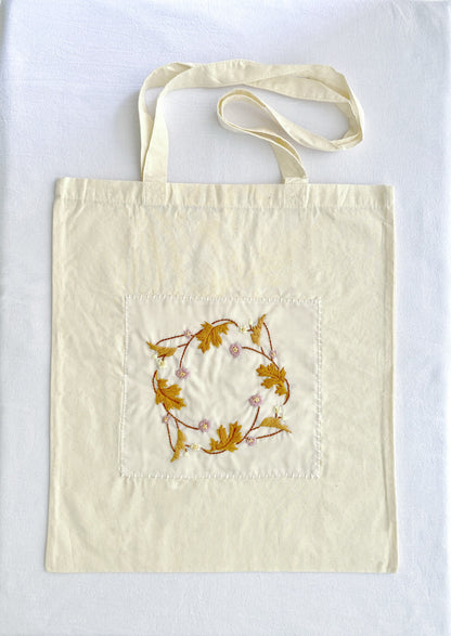 soft textured cotton tote with refined floral embroidery