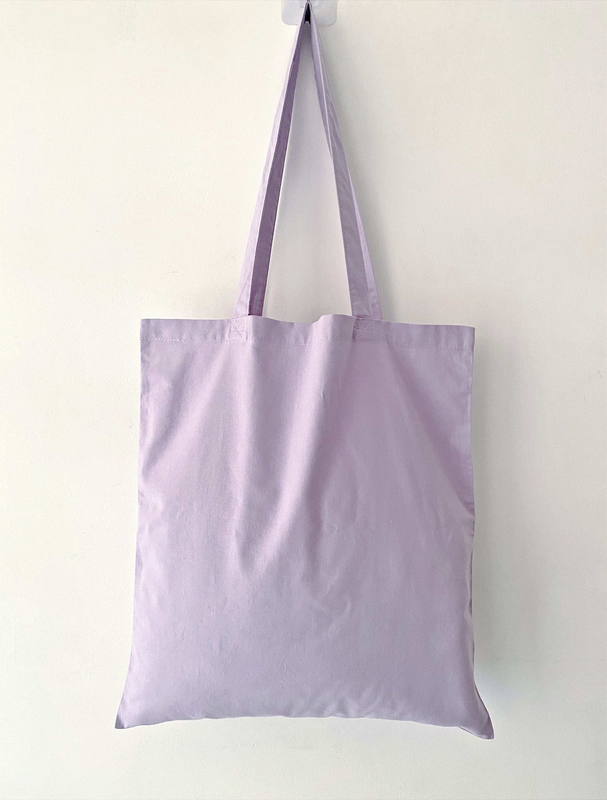Versatile embroidered tote bag for work, school, or travel