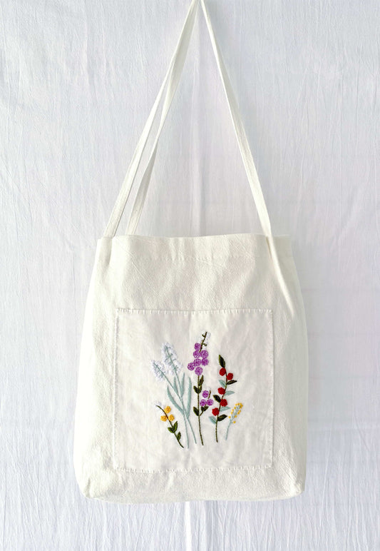 eco-friendly soft linen tote with embroidered flowers