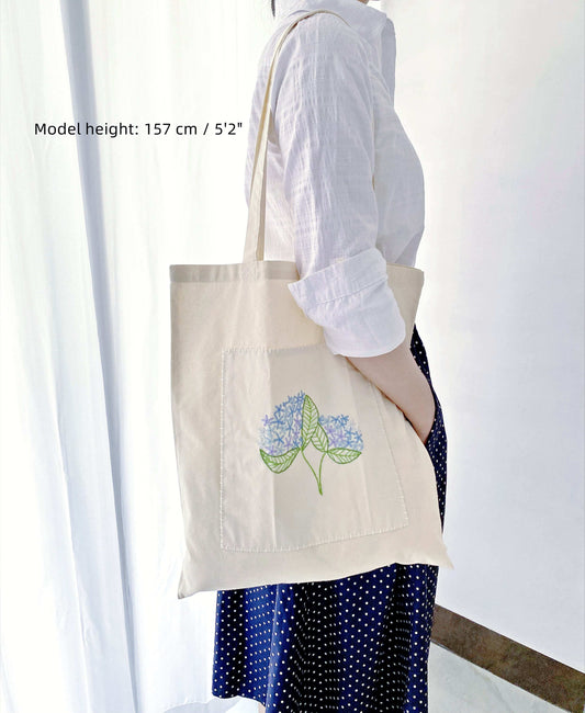 soft durable tote with hand embroidered floral motifs