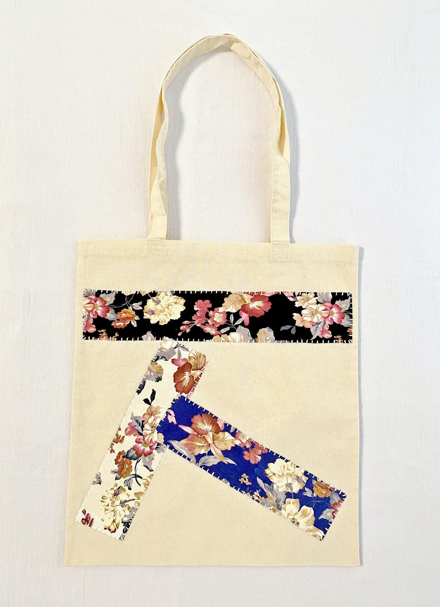 Handmade patch detail on soft cotton bag