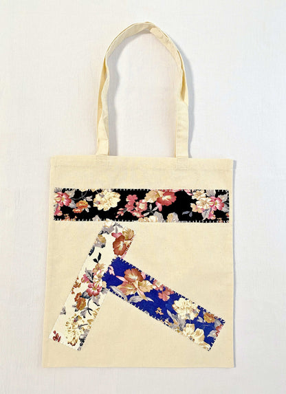 Handmade patch detail on soft cotton bag