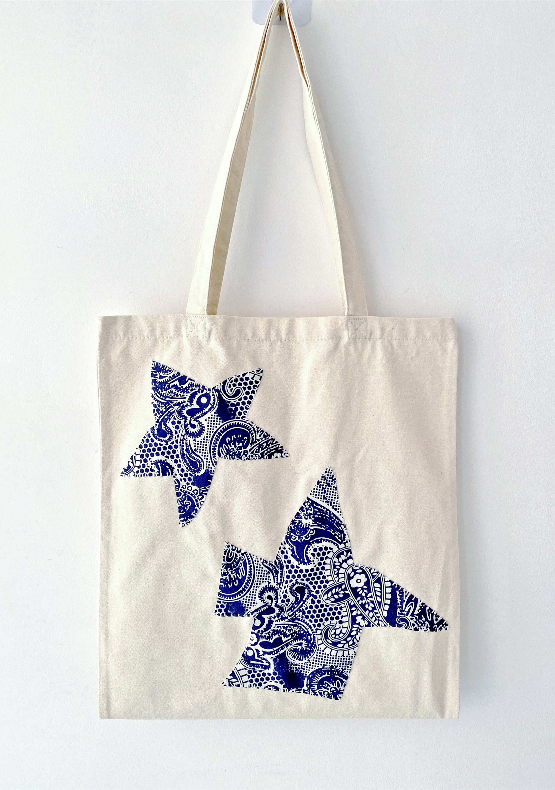 Handcrafted patchwork on a sturdy canvas shoulder bag for daily use