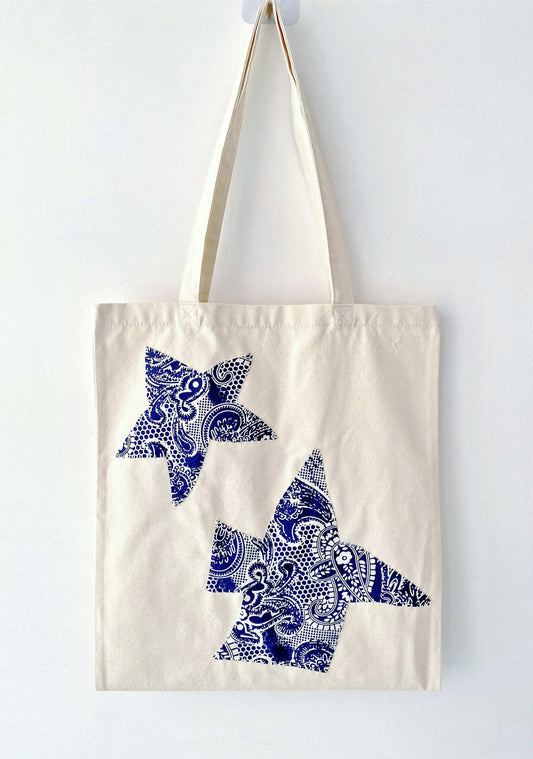 Handcrafted patchwork on a sturdy canvas shoulder bag for daily use