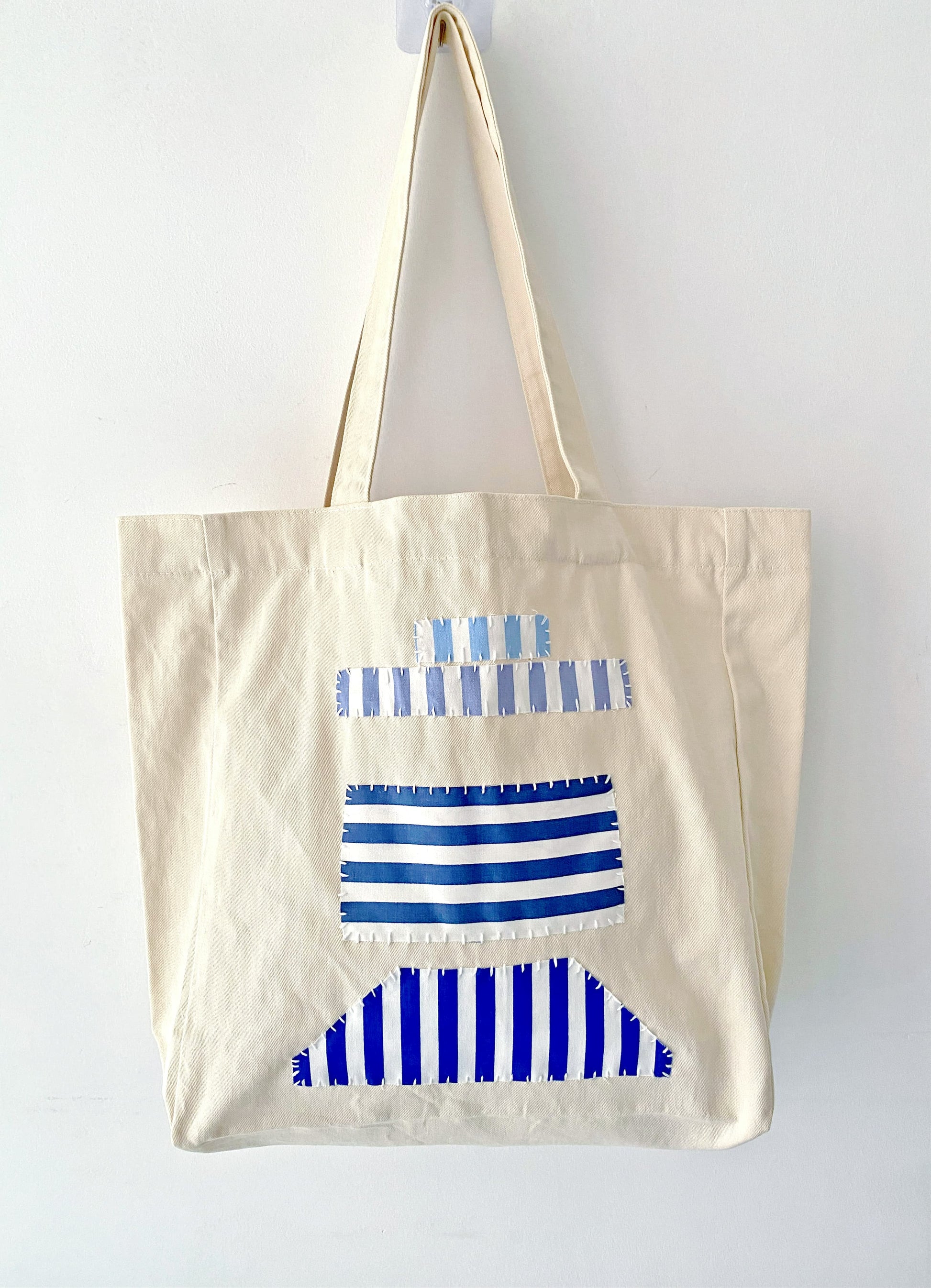 Casual women's cotton bag with handcrafted stitched designs, perfect for slow living enthusiasts