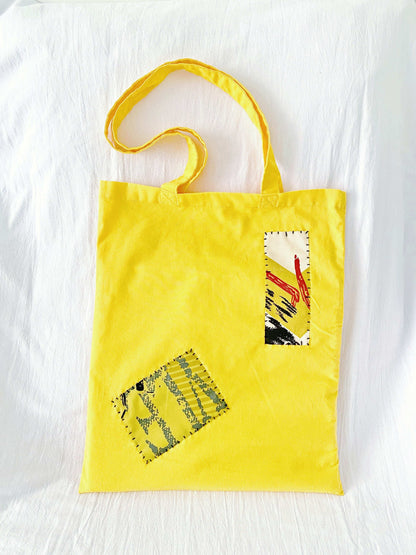 Eco tote with artistic flair from sewn patchwork, designed for comfort and capacity