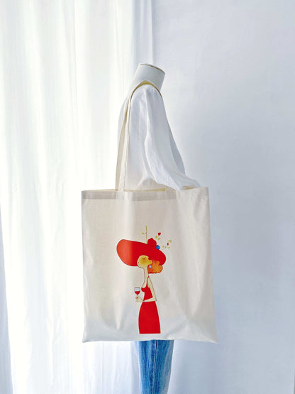 Spacious cotton shoulder tote for sustainable shopping or travel.