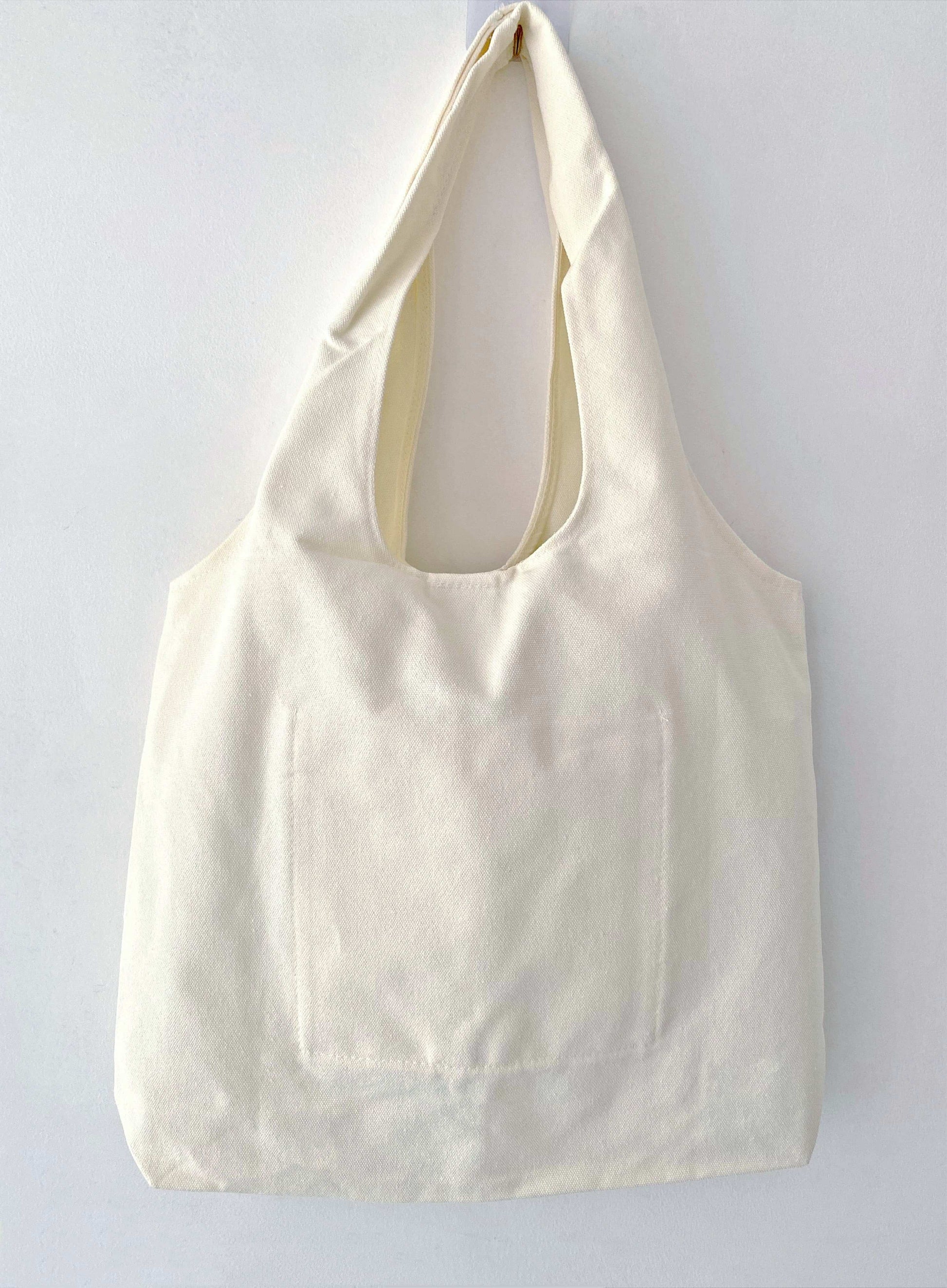 eco conscious gift tote bag with artistic patchwork