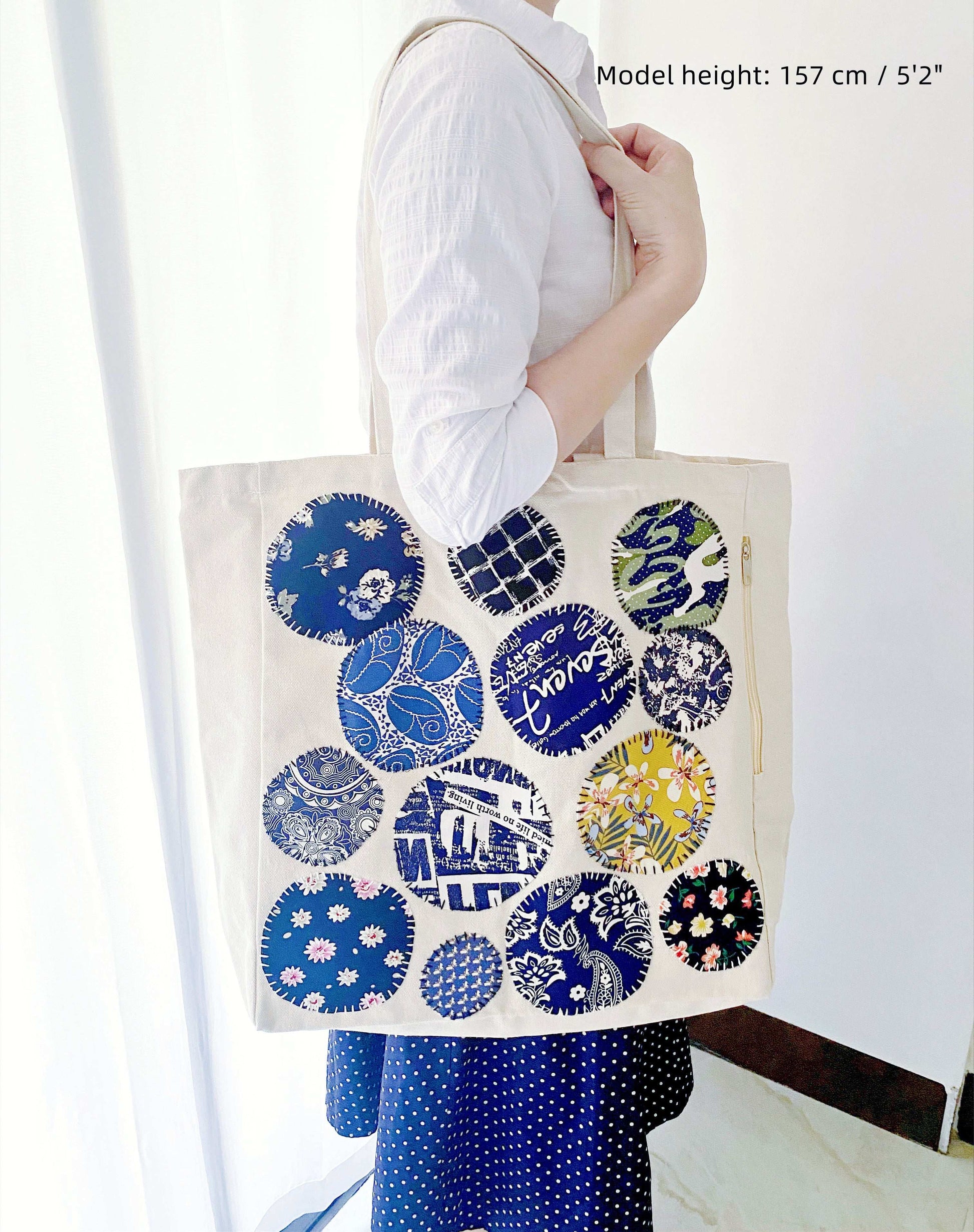 Natural canvas shoulder bag designed for thoughtful holiday gifting