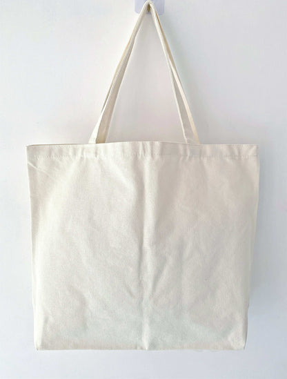 Durable everyday canvas bag with eco-friendly handmade patchwork accents