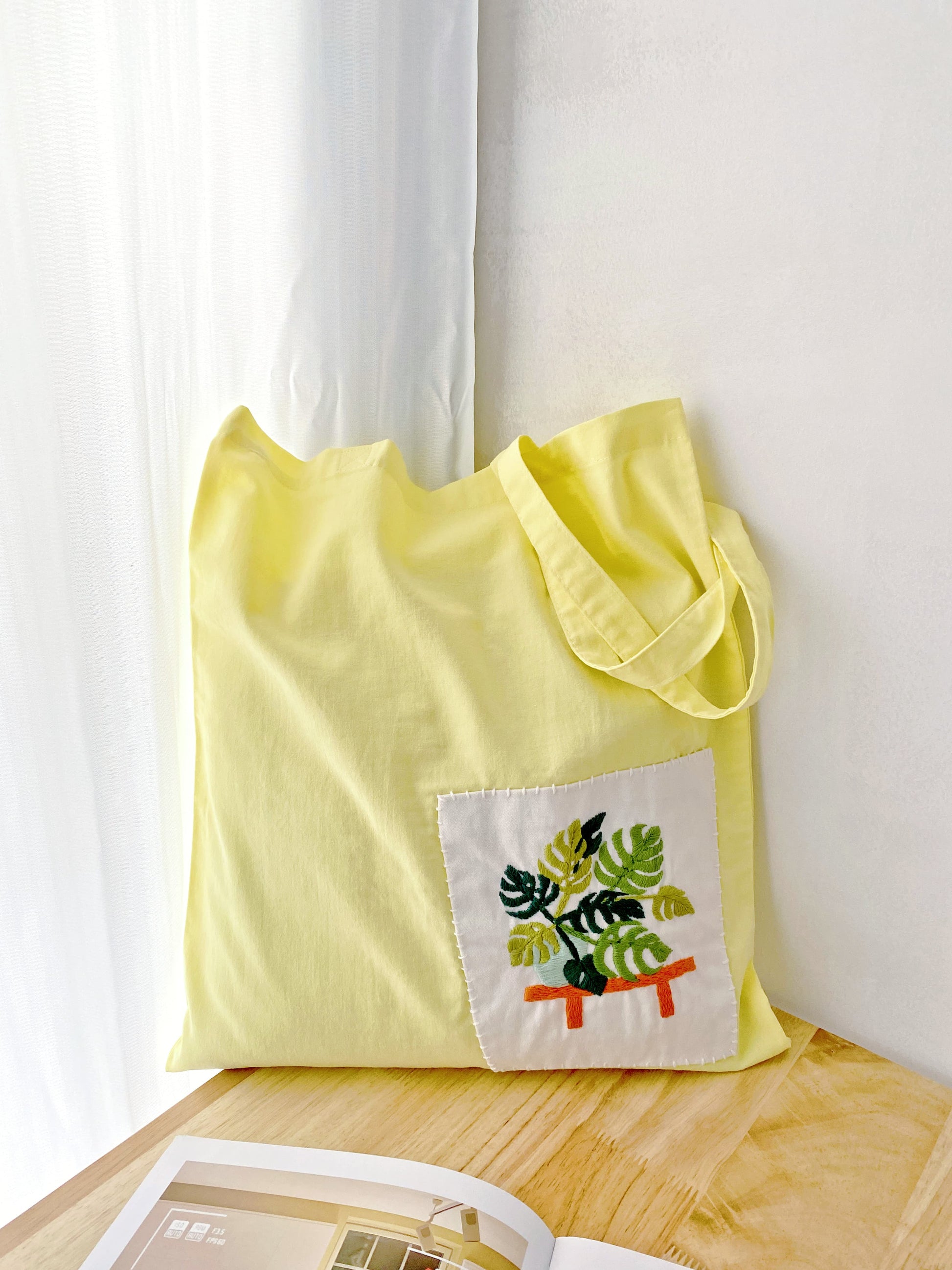 eco conscious cotton tote with floral hand embroidery