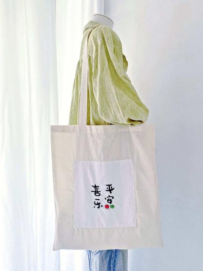 soft durable cotton tote with hand embroidered unique motifs