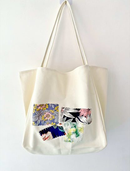Sustainable women's tote shoulder bag with hand-sewn patchwork, ideal for those embracing unique designs and natural elegance.