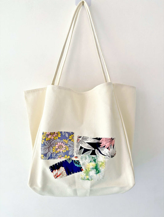 Sustainable women's tote shoulder bag with hand-sewn patchwork, ideal for those embracing unique designs and natural elegance.