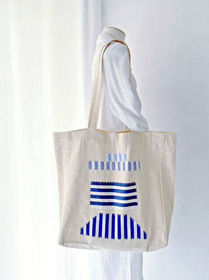 Lightweight cotton tote that combines modern simplicity with eco values