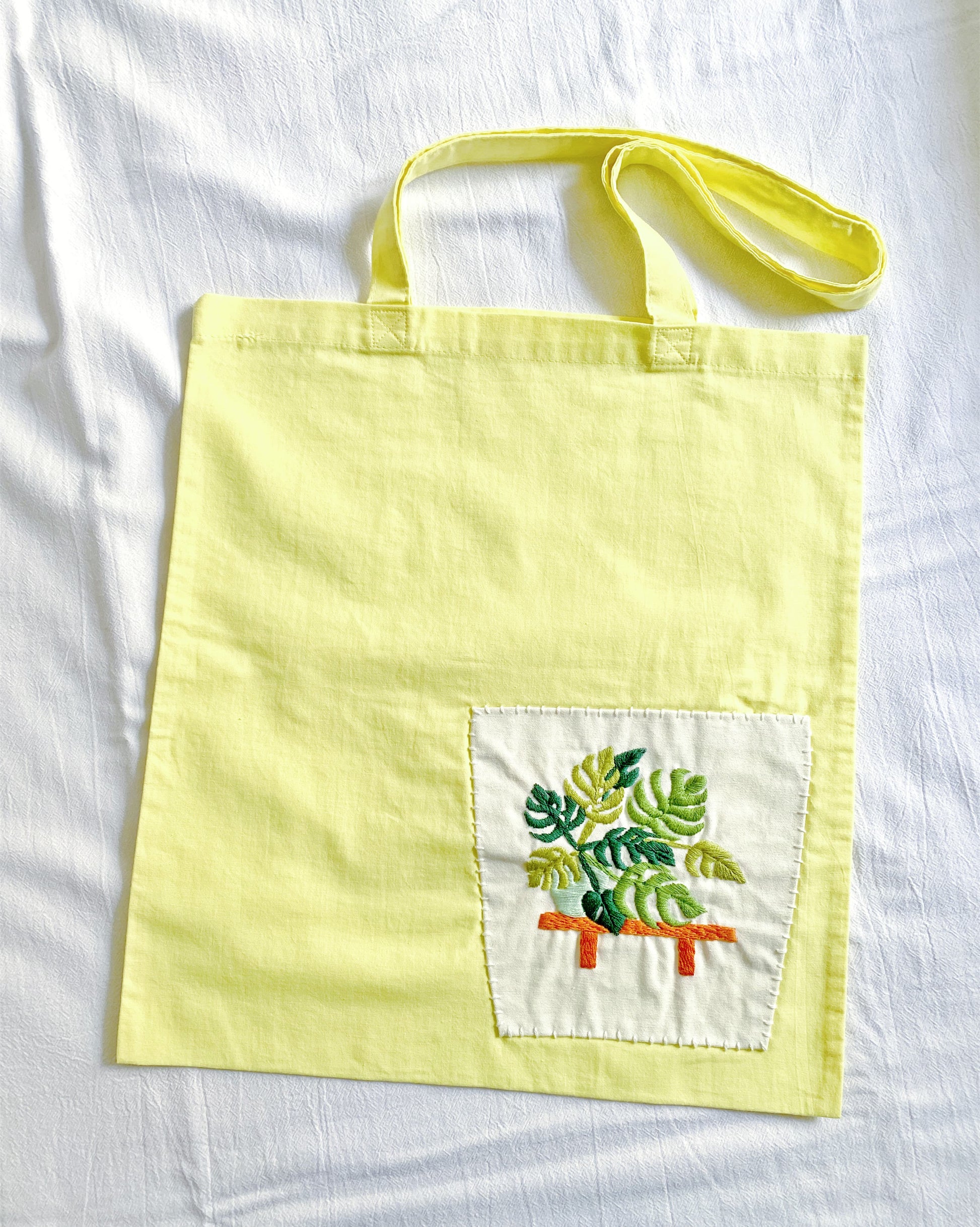 handmade embroidered plant art tote for nature lovers and mindful gifting