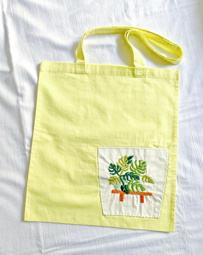 handmade embroidered plant art tote for nature lovers and mindful gifting